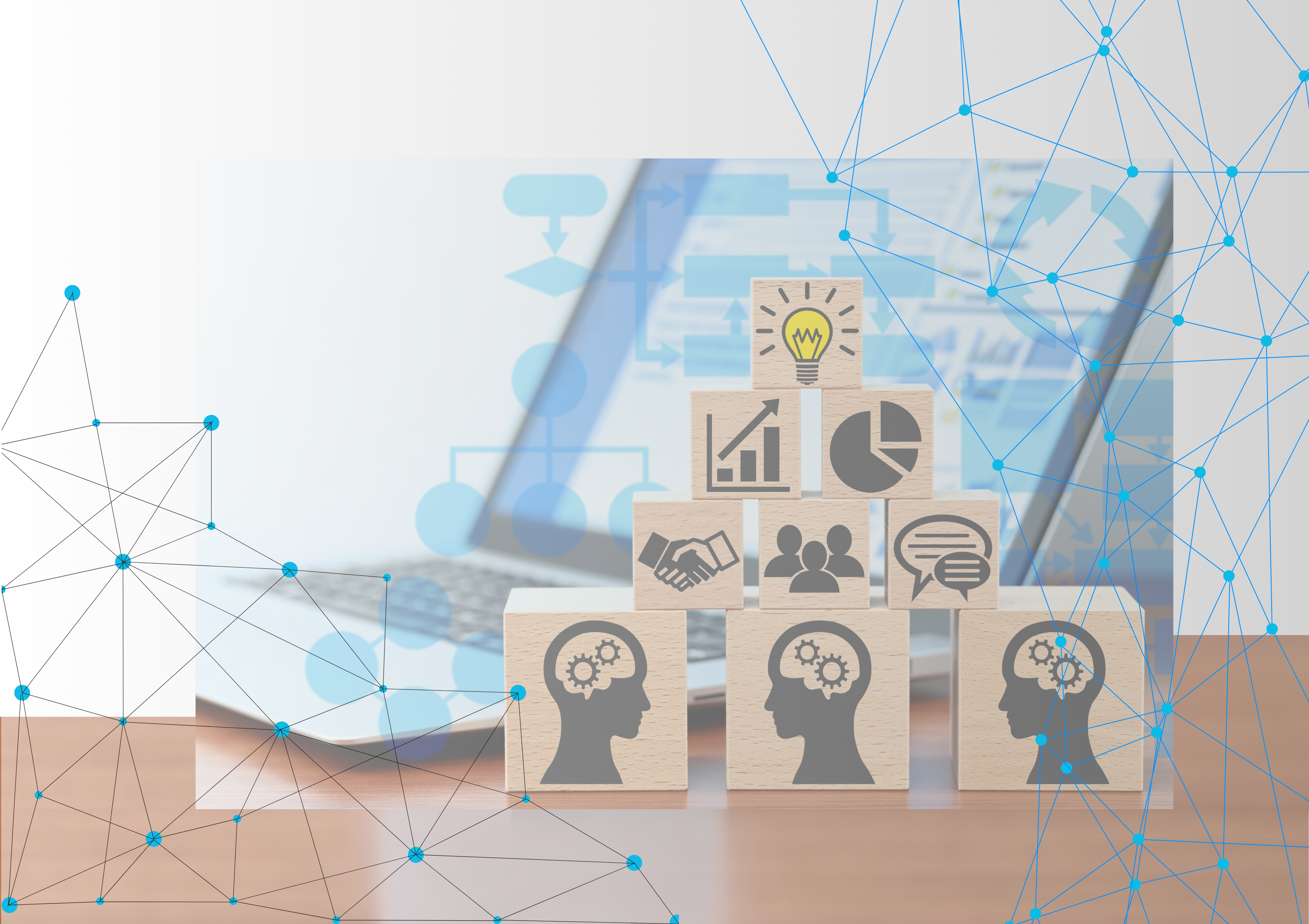 Ein Laptop und Bauklötze mit verschiedenen Symbolen und einer Grlühbirne - symbolisch für Fachveranstaltungen